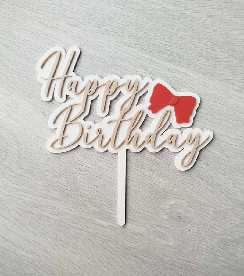 printed birthday topper with bow
